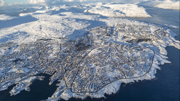 Aerial photo of snow-covered Tórshavn during winter.