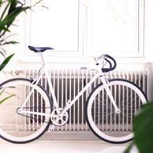 Bicycle in front of radiator